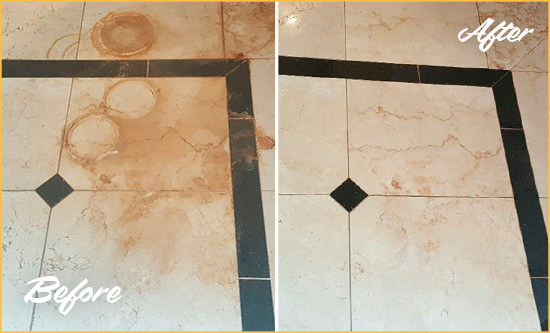 Before and After Picture of a Port Orange Hard Surface Restoration Service on a Marble Floor to Eliminate Rust Stains